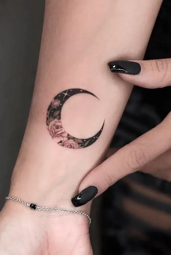 Delicate and unique moon wrist tattoo by @tattoosmap