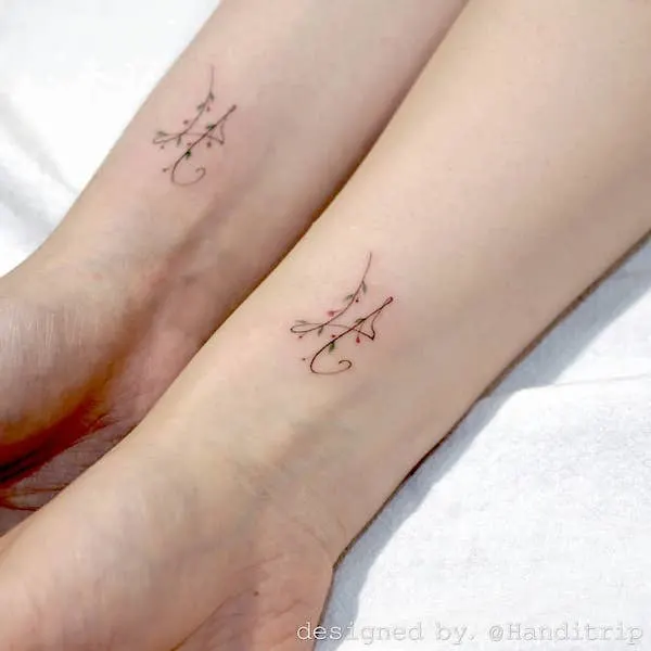 Initial wrist tattoos for family by @handitrip