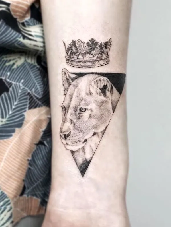 Lion and crown wrist tattoo by @tattooist_irae2