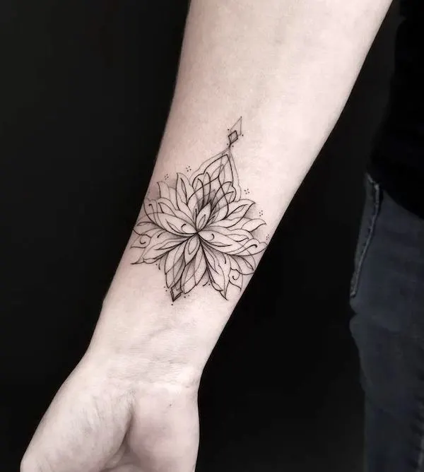 Lotus wrist tattoo by @crystal_ink
