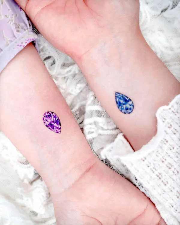 Matching gem tattoos for best friends by @tattooist_solar