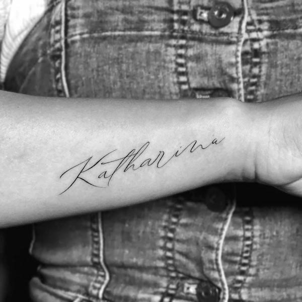 Name side wrist tattoo by @masnu.tattoo
