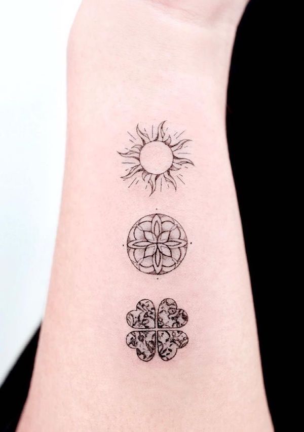 Natural symbol side wrist tattoo by @tattooist_solar