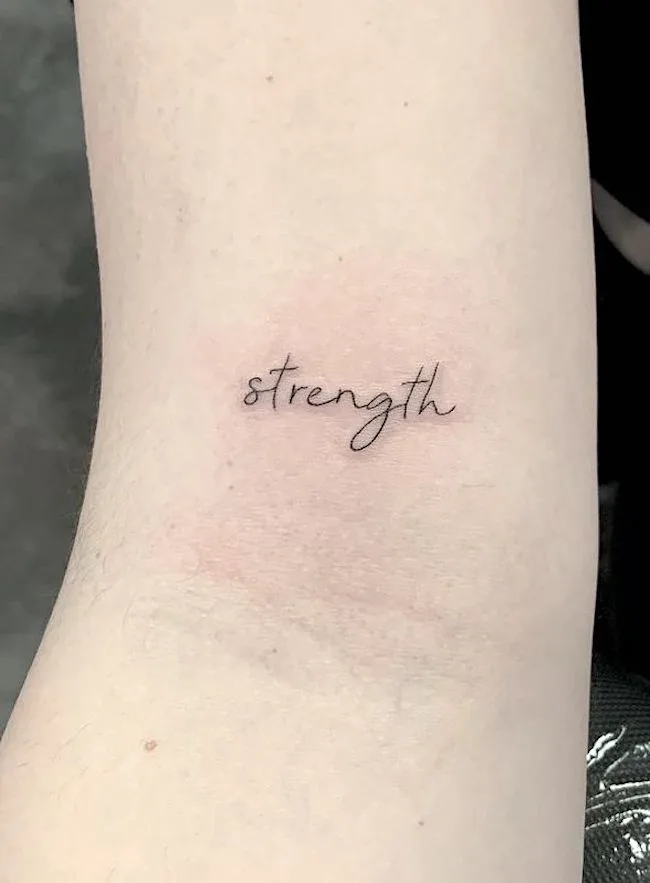 Courage tattoo on the right side