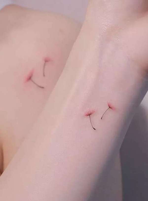 Small and simple dandelion wrist tattoo by @handitrip