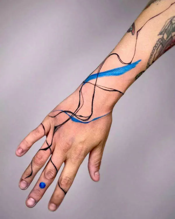 Super cool wrist tattoo for women by @polandtattoos- Wrap around bracelet wrist tattoos