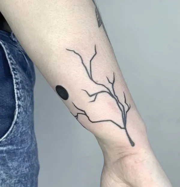 Tree tattoo on the side of wrist by @_antissociana