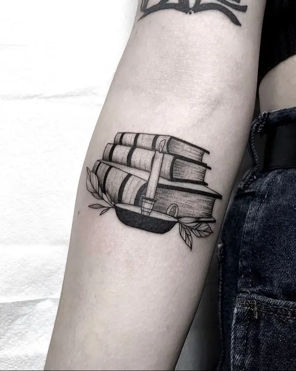 Books tattoo for teacher by @jenntacotattoos