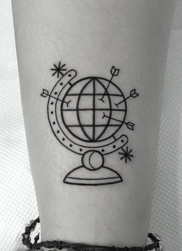 Globe and arrow tattoo by @nancydestroyer