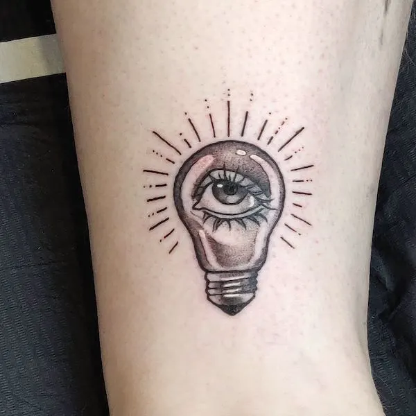 Lightbulb teacher tattoo by @j.laakkonentattoo