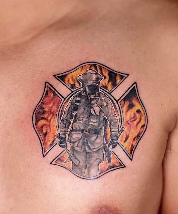 Maltose cross chest tattoo for firefighters by @kromatattooph