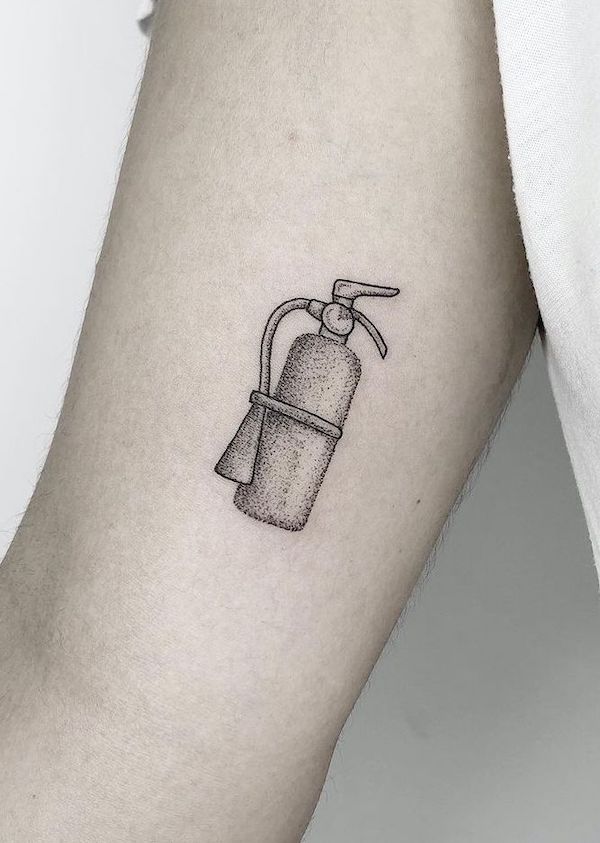 Small black and grey fire extinguisher arm tattoo by @dindottattoo