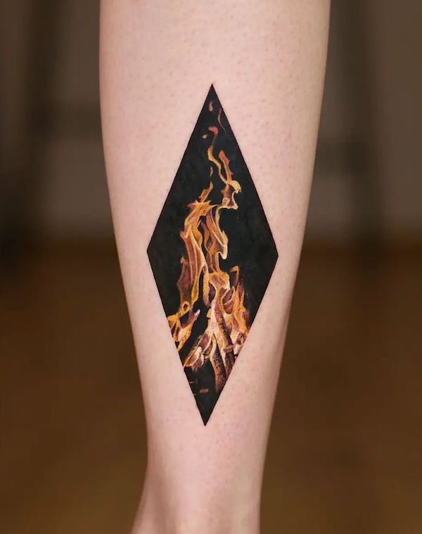 Stunning flames tattoo by @thommesen_ink