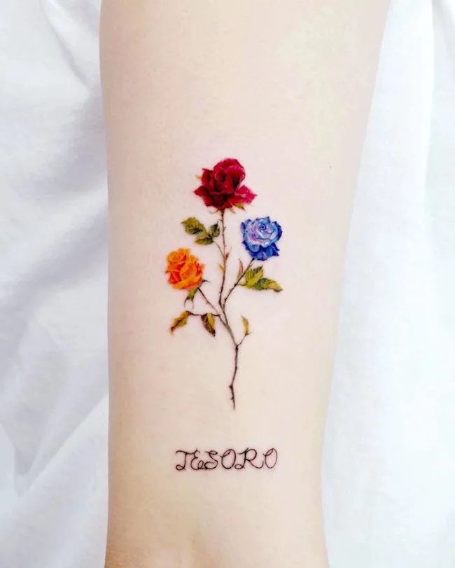 Triple color roses tattoo by @tilda_tattoo