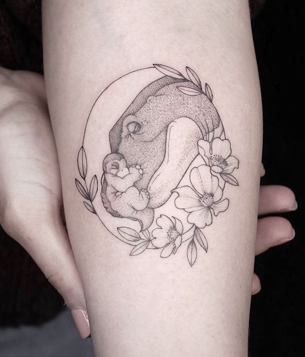 Baby and mother dinosaur by @tattooculturemag