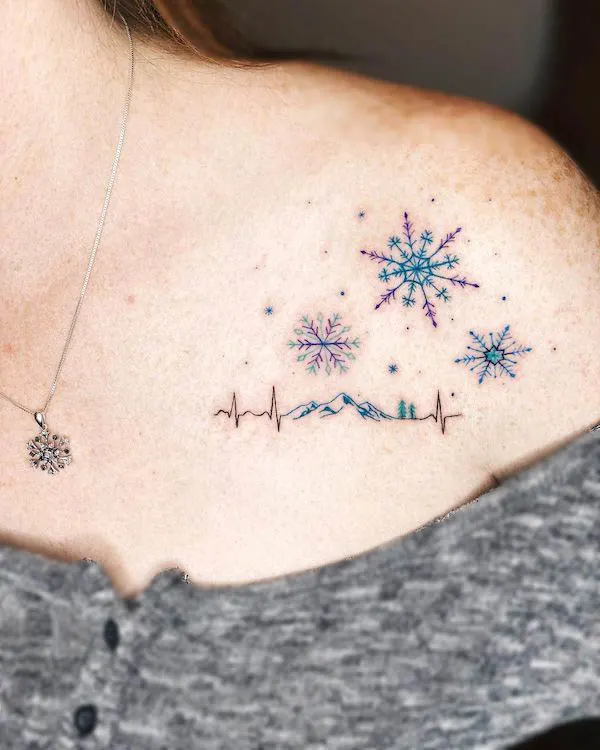 Fireworks and EKG tattoo on the shoulder by @amberstarrartistry