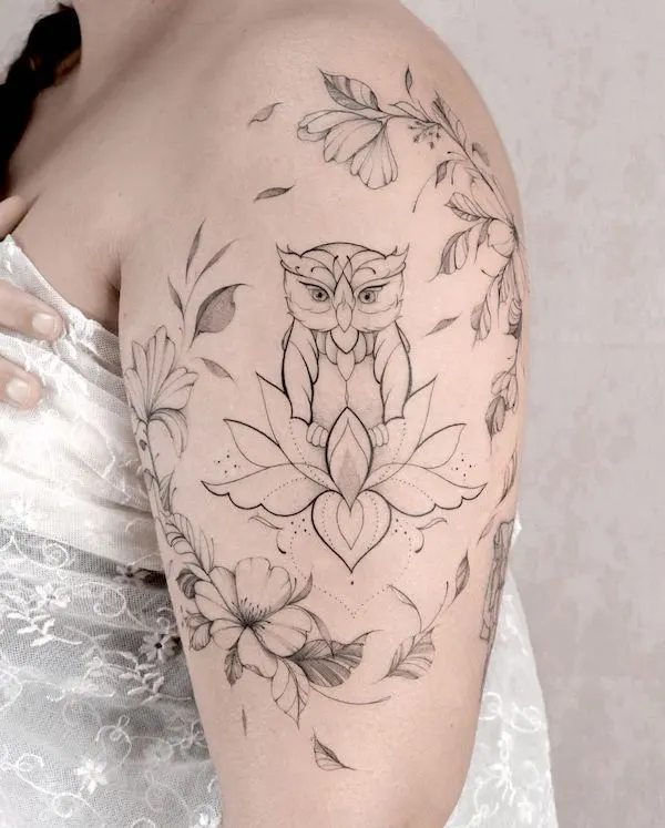 Lotus and owl floral sleeve tattoo by @india.tattooartist