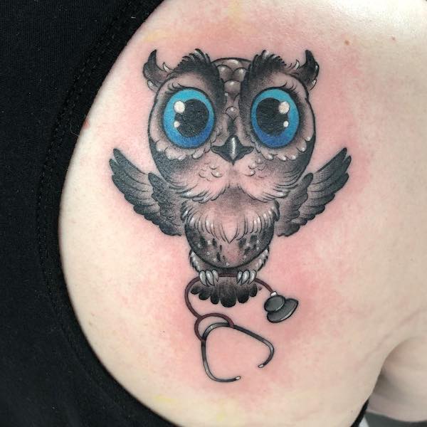 Nurse owl shoulder tattoo by @tallsarahtattoos