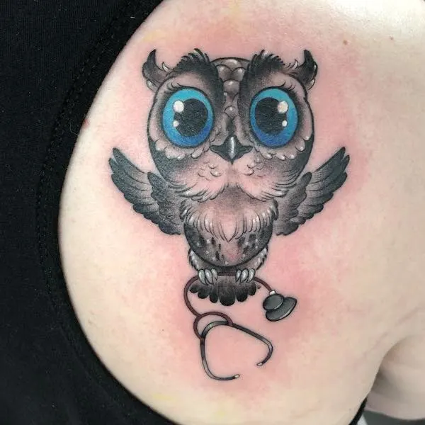 Nurse owl shoulder tattoo by @tallsarahtattoos