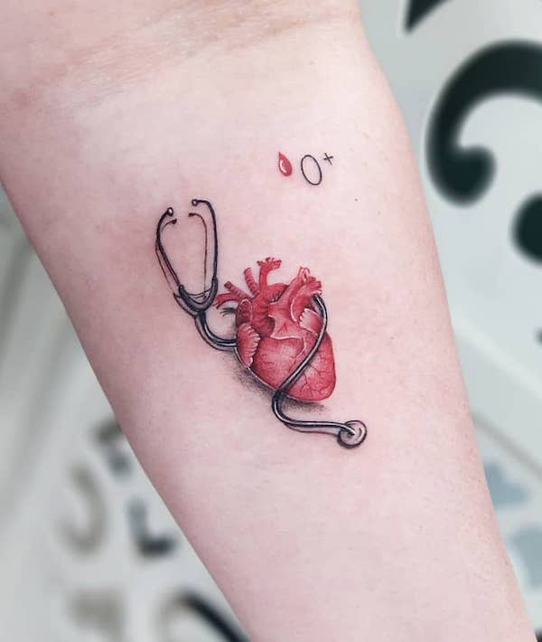 Stethoscope and heart tattoo by @zfelixtattoo