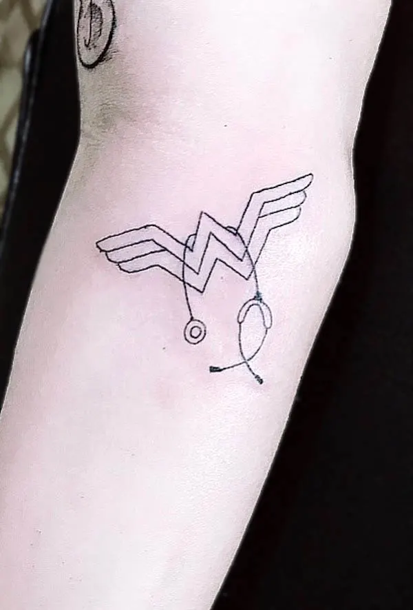 Wonderwoman and stethoscope tattoo by @tattooalegre