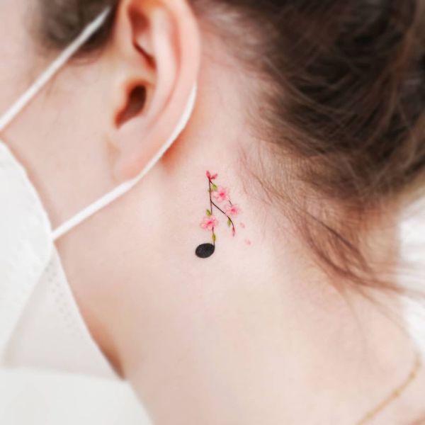 Behind the ear music note tattoo by @e.ple_tattoo