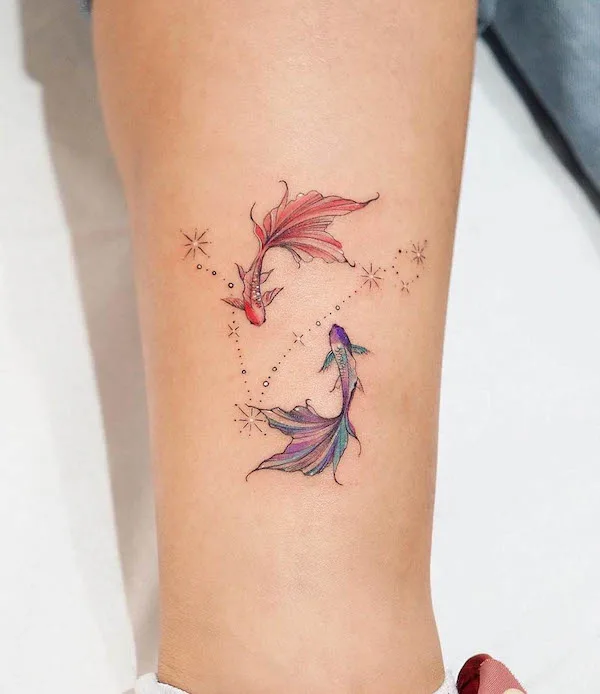 Colorful fish tattoo for Pisces by @hnnhtattoo