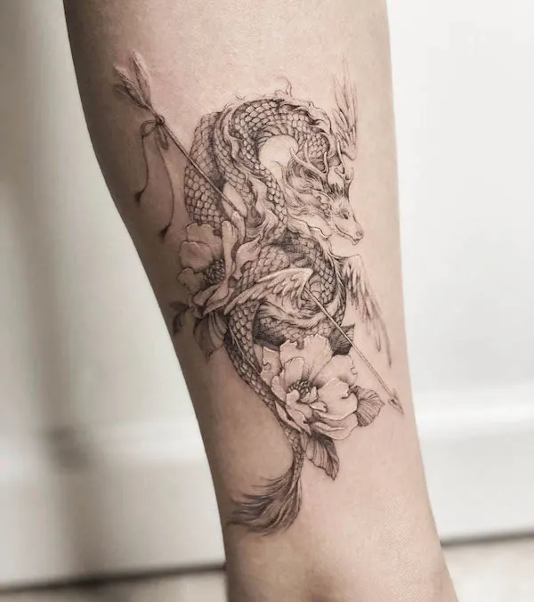 Dragon and arrow tattoo by @jaime.ink