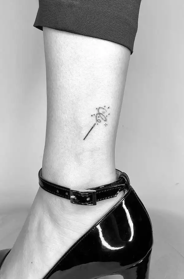 Small meaningful magic wand tattoo by @cagridurmaz
