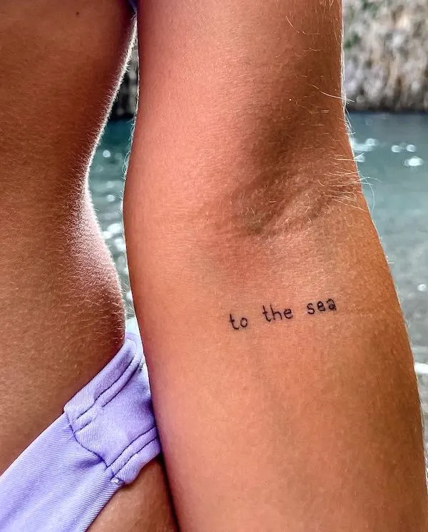 To the sea_small tattoo for travelers by @tes.travelss