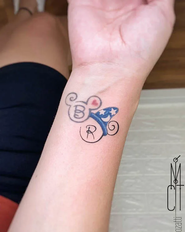 Double letters Disney tattoo by @mcrozatti
