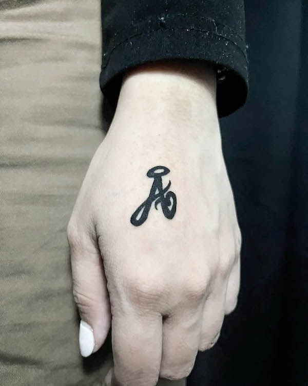 Initial A in bold hand tattoo by @juanlabao