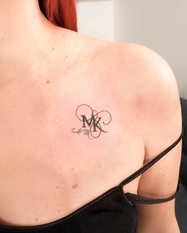 MK letters tattoo by @angiehandpokes