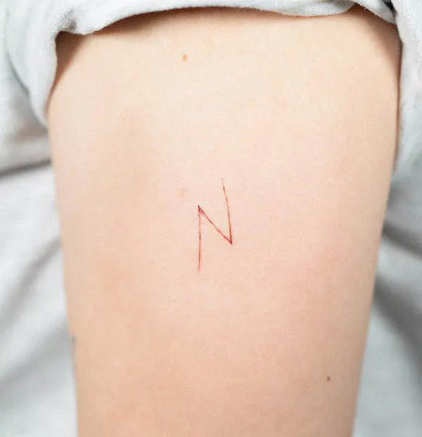 N initial tattoo by @olive_forestink