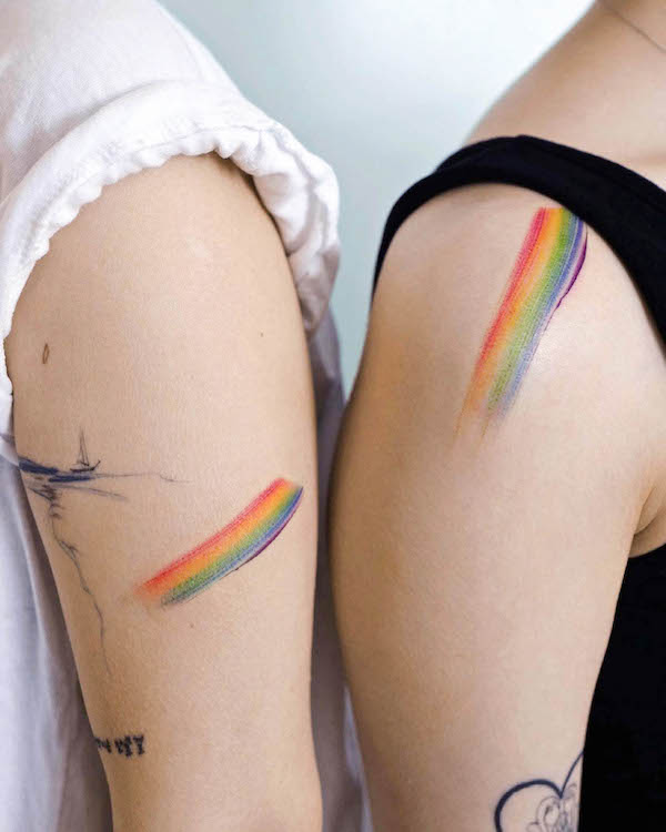 Matching rainbow strokes for best friends by @tattoo_a_piece