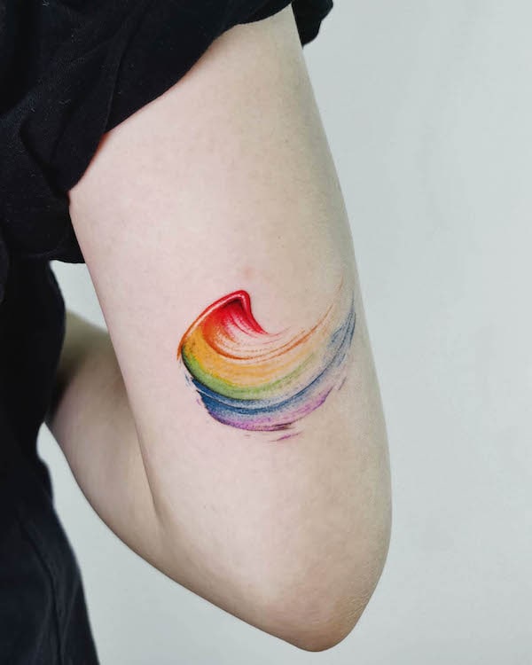 Rainbow paint tattoo by @deartattoohk
