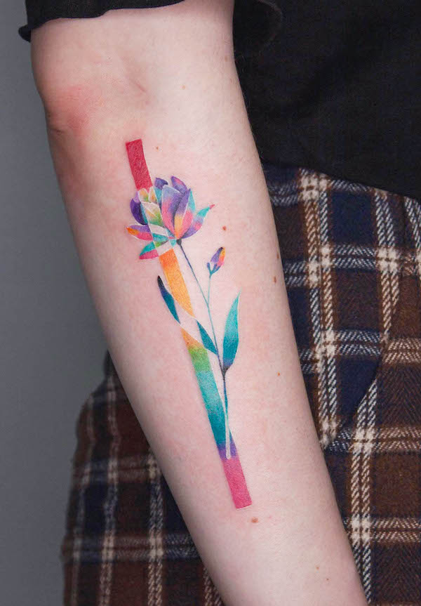 Rainbow flower by @elizabeth.tattooer