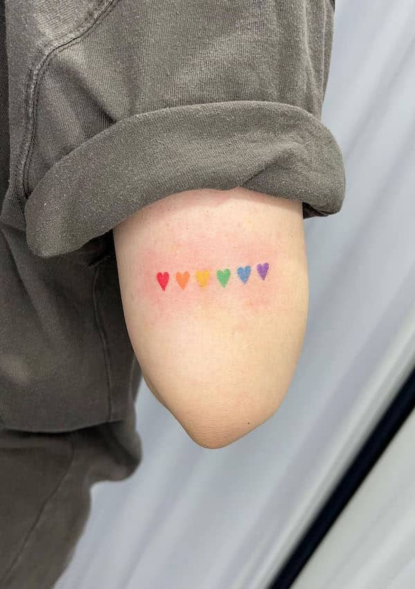 Rainbow hearts by @goldwith.tattoo