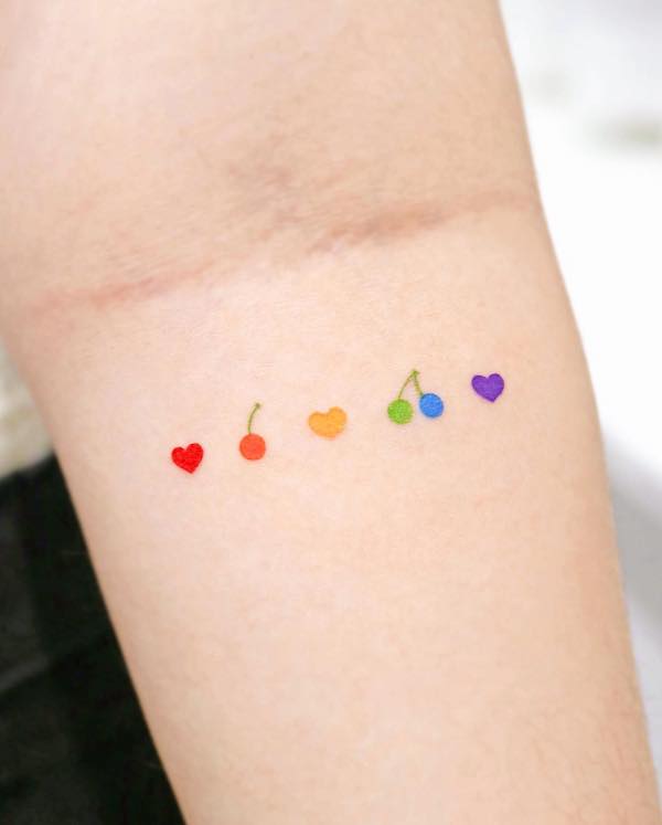 Small rainbow cherries by @heemee.tattoo
