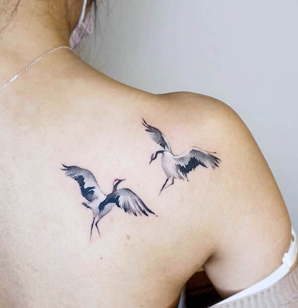 Elegant crane shoulder tattoo by @_.yiching._