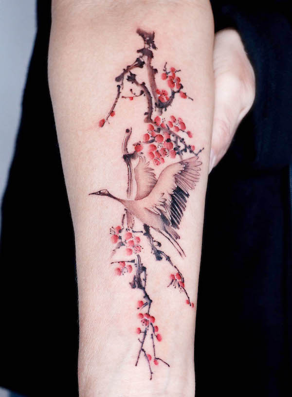 Cherry blossom and crane tattoo by @yeobaeg_tattoo