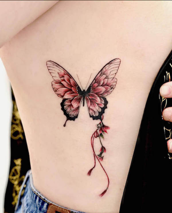 Feminine butterfly tattoo by @forest__tt