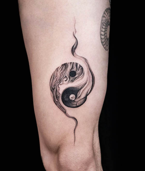 Yin and Yang ink wash tattoo by @ink.feb24