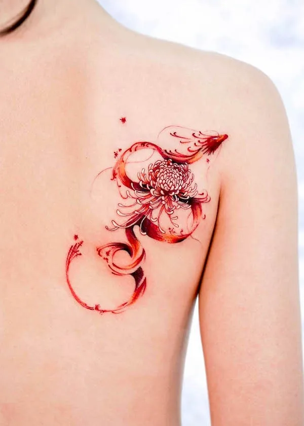 Red spider lily and dragon shoulder tattoo by @hwyl.tattoo