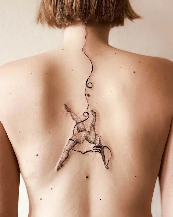 Circus girl spine tattoo by @tata.jouaux.art
