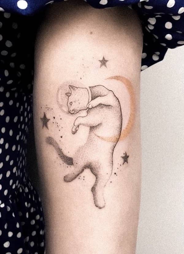 Astronaut cat and star arm tattoo by @miki_tatuuje