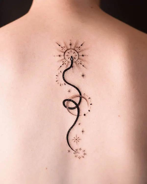 Stunning black snake back tattoo by @norangtattoo