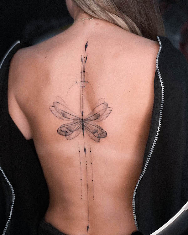 Butterfly spine tattoo by @grettel.inkaholik