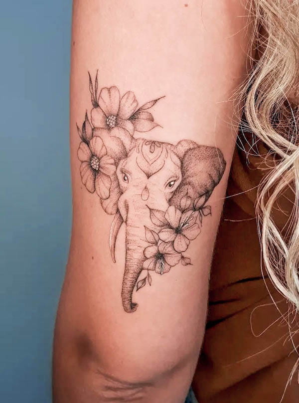 Flower and elephant arm tattoo by @nancimtattoo