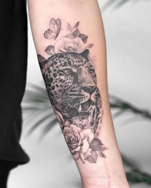 Leopard forearm tattoo by @kyla_rose_tattoo